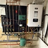 Completed wall-mounted combi boiler installation with professionally organized plumbing connections in Niskayuna