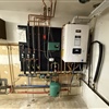 Newly installed high-efficiency combi boiler system with piping and heating connections in a Niskayuna home